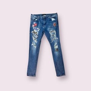 Amiri Light Blue Patchwork Distressed Jeans 40
